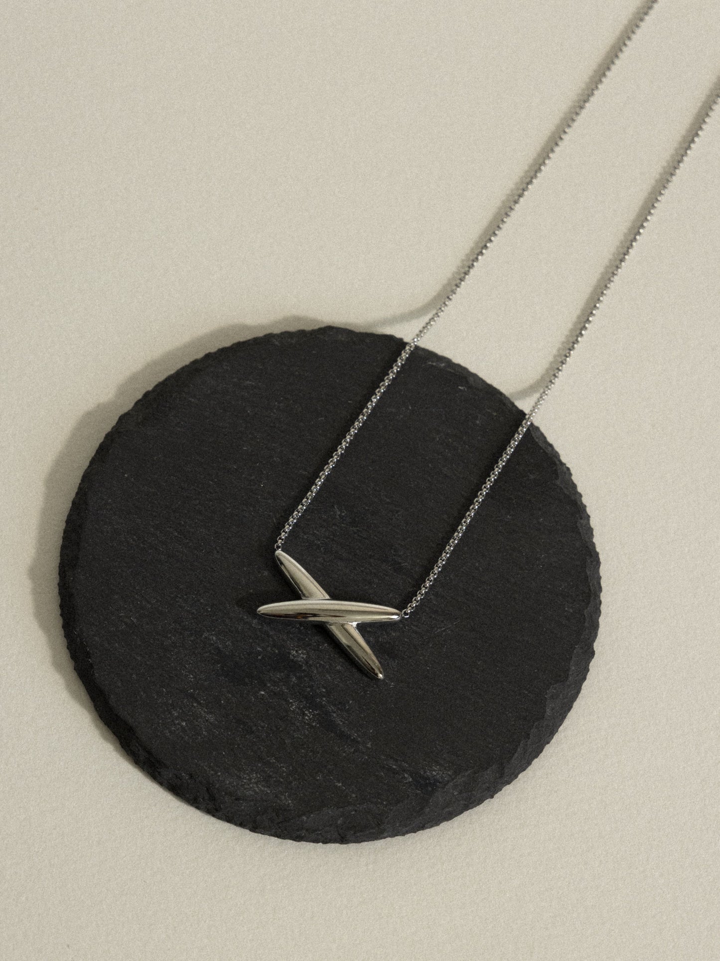 Contemporary cross necklace