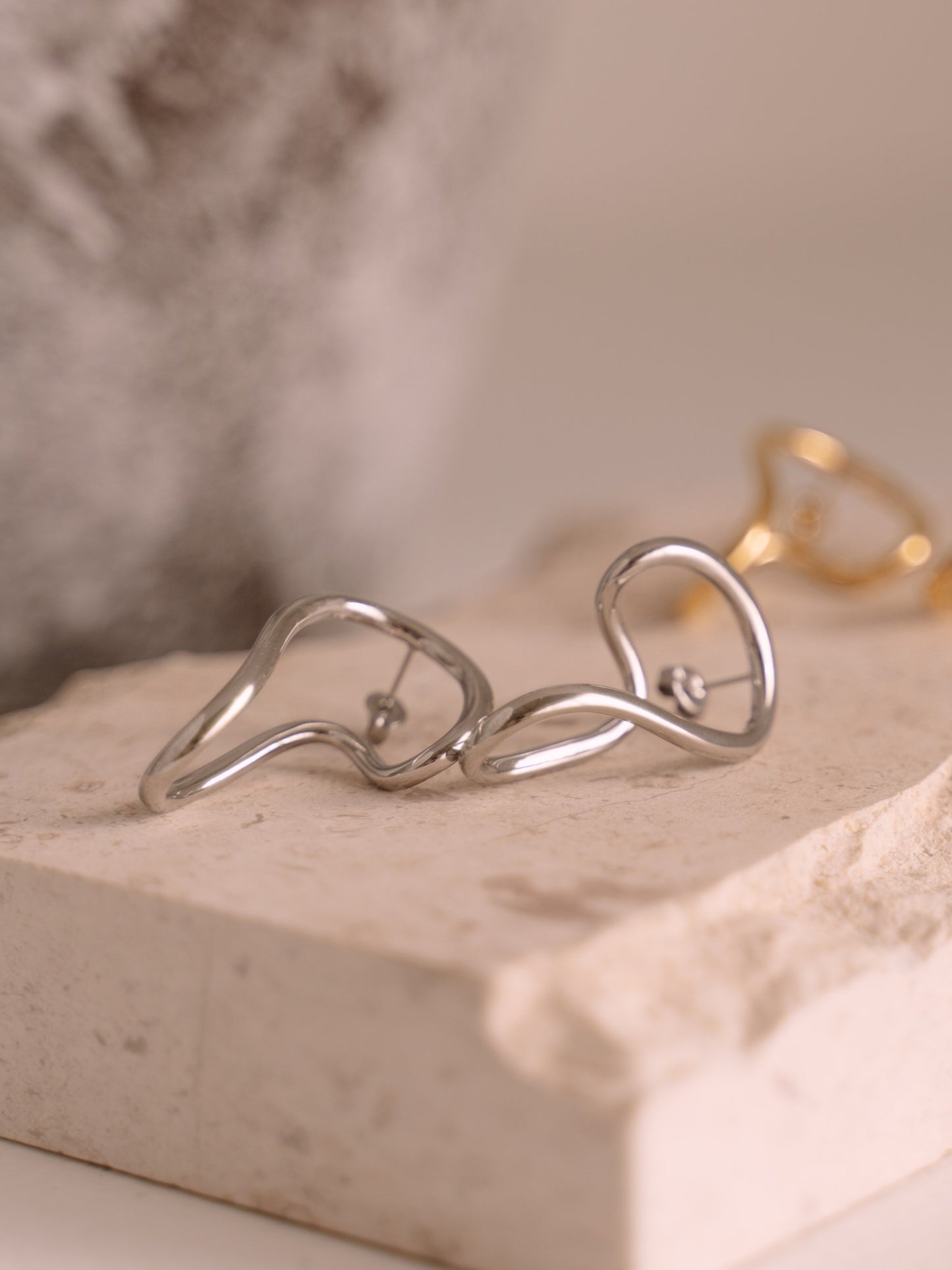 Non-uniform earrings