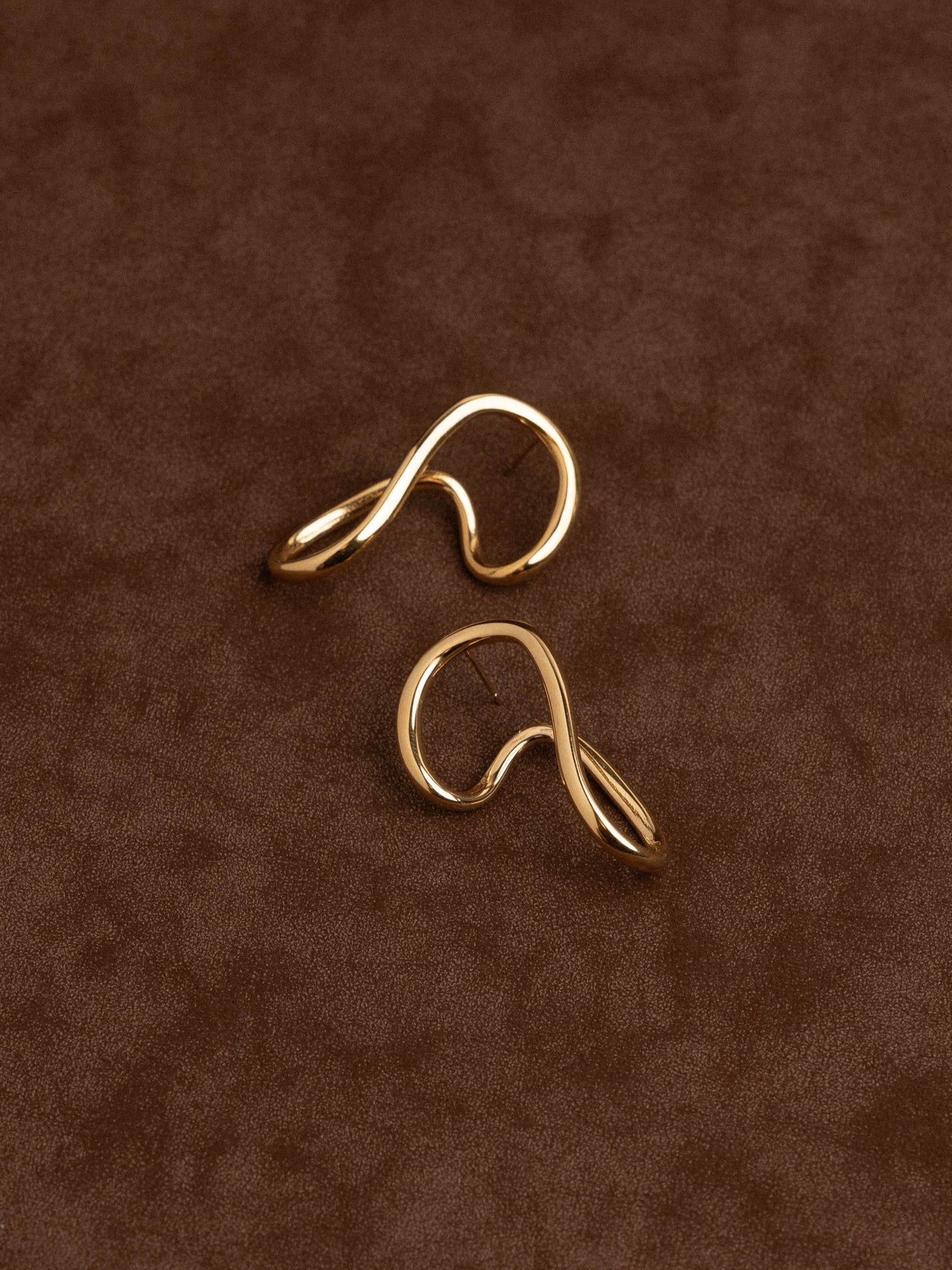 Non-uniform earrings