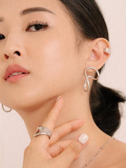 Non-uniform earrings