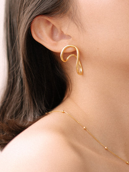 Non-uniform earrings