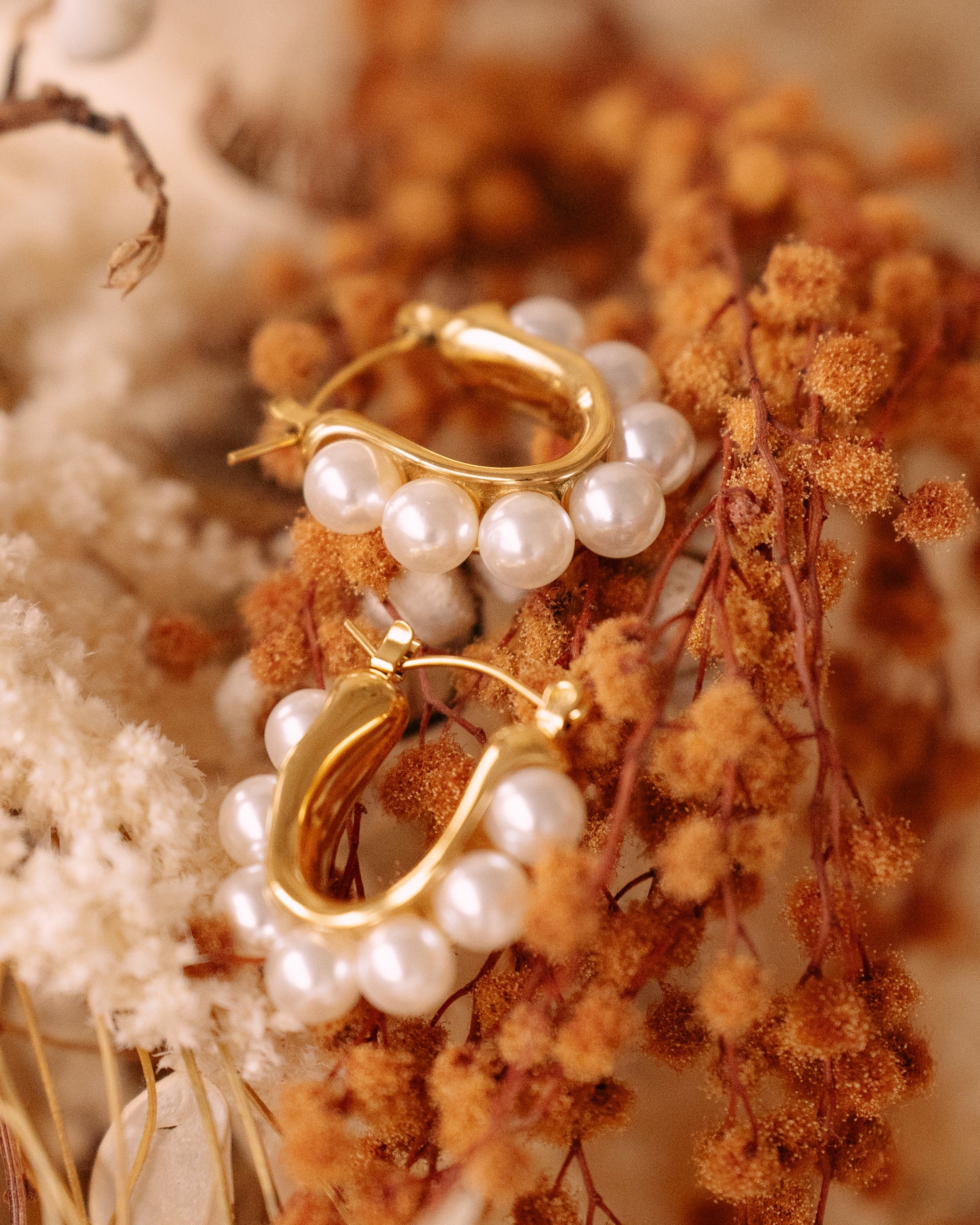 Pearl embrace earrings