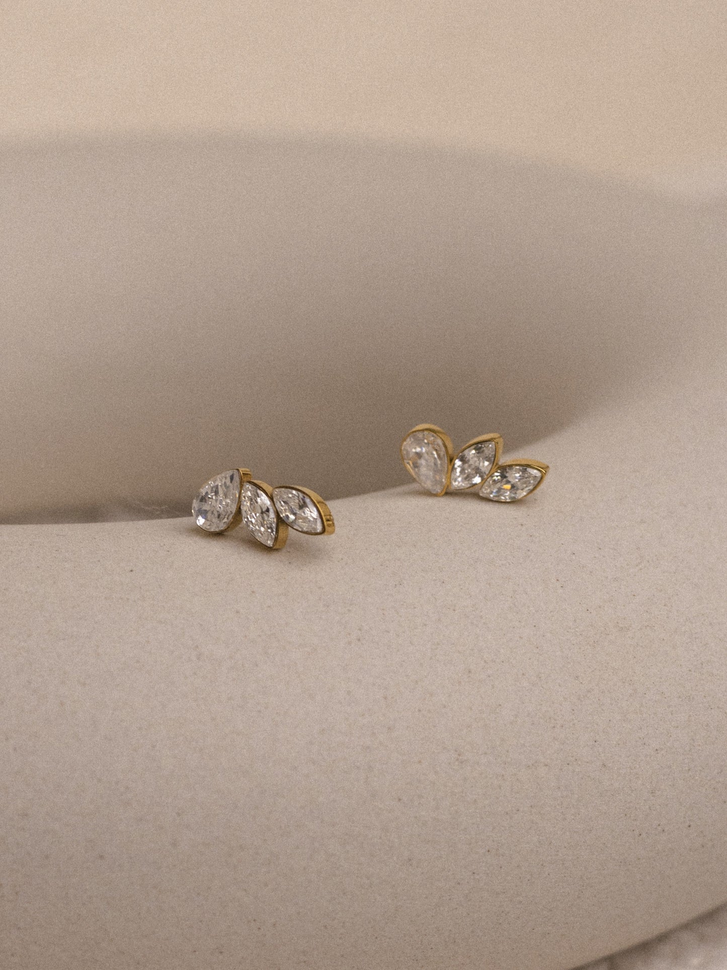 Sparkling angel wing studs