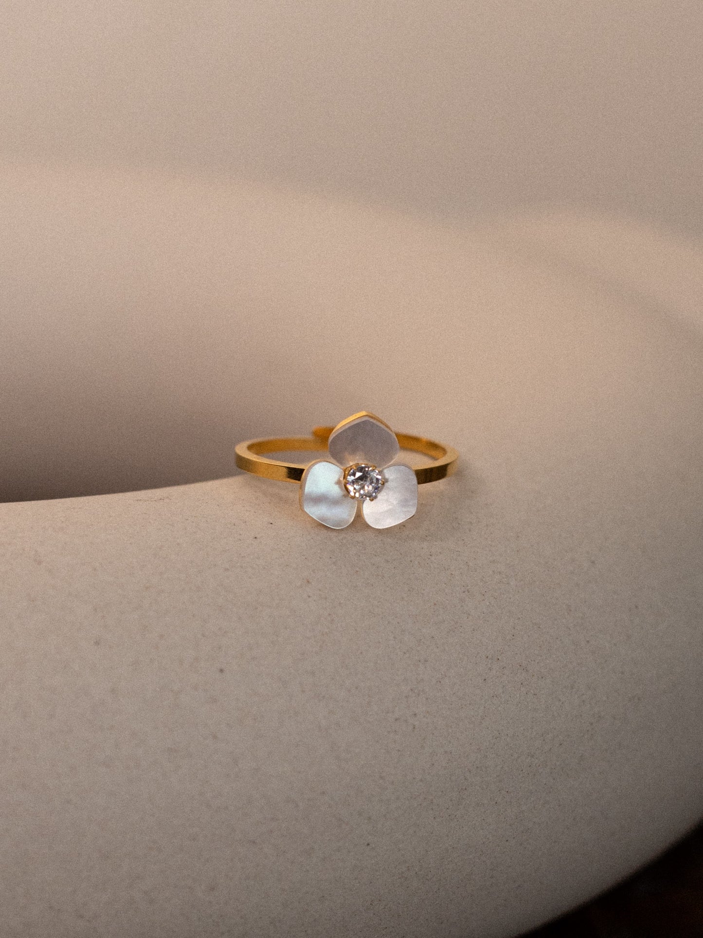 Opalescent shell petal ring